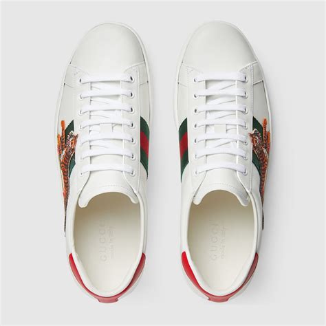 gucci tiger shoes men's|Gucci tiger sneakers high.